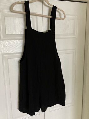 Black romper with generous pockets